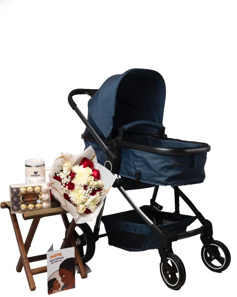 Thoughtful baby shower gift bundle with flowers, chocolates, and a personalized card for new moms.