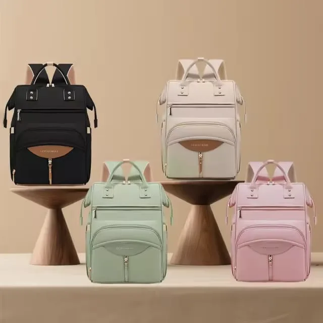 Waterproof diaper bag backpack with multiple compartments for baby essentials.